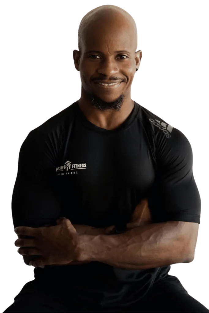 A Function Fitness coach guiding a one-on-one training session in the DTLA studio